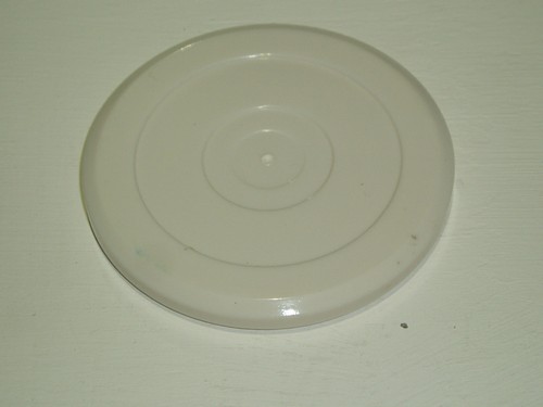 White air hockey pucks in - x,